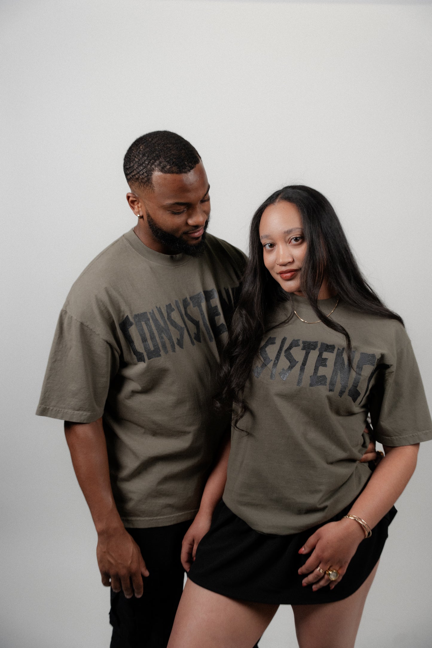 "CONSISTENCY" TAPE TEE