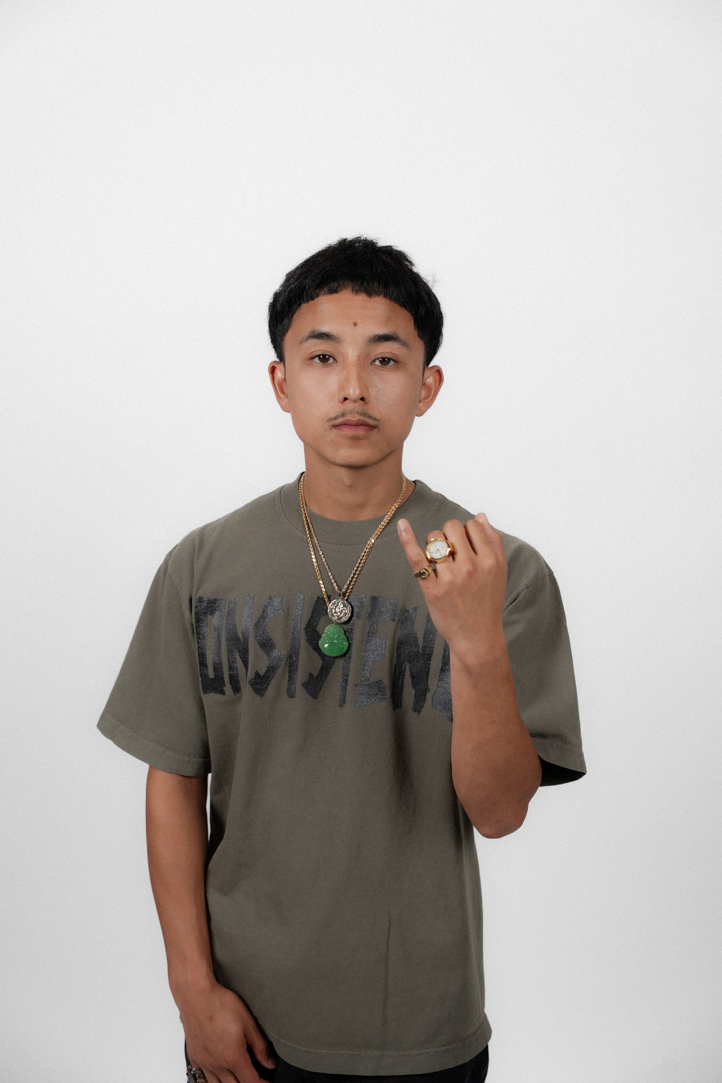 "CONSISTENCY" TAPE TEE